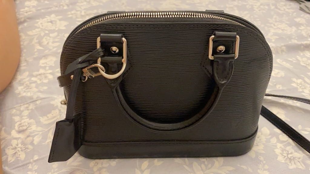 LV Alma pm leather handbag