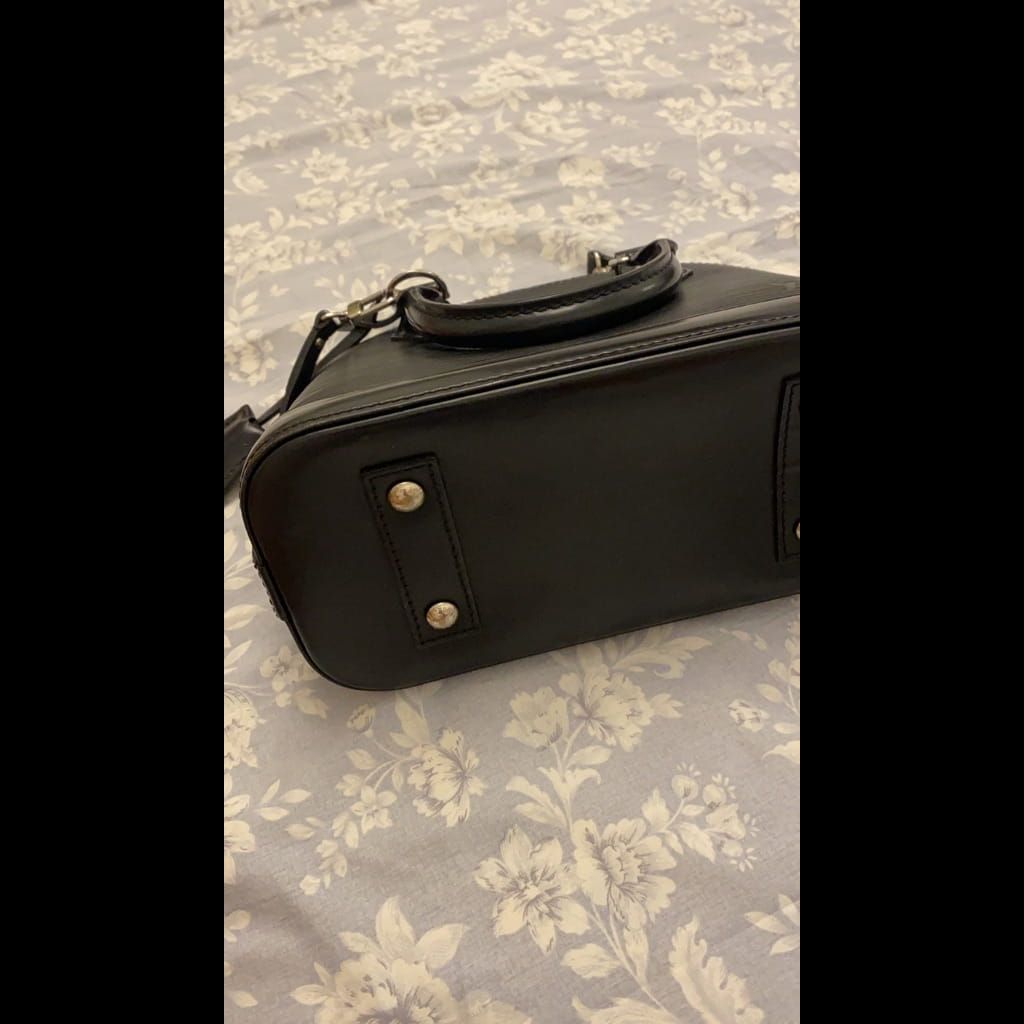 LV Alma pm leather handbag