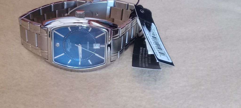Kenneth Cole NewYork. Genuine Diamond Stainless steel Watch