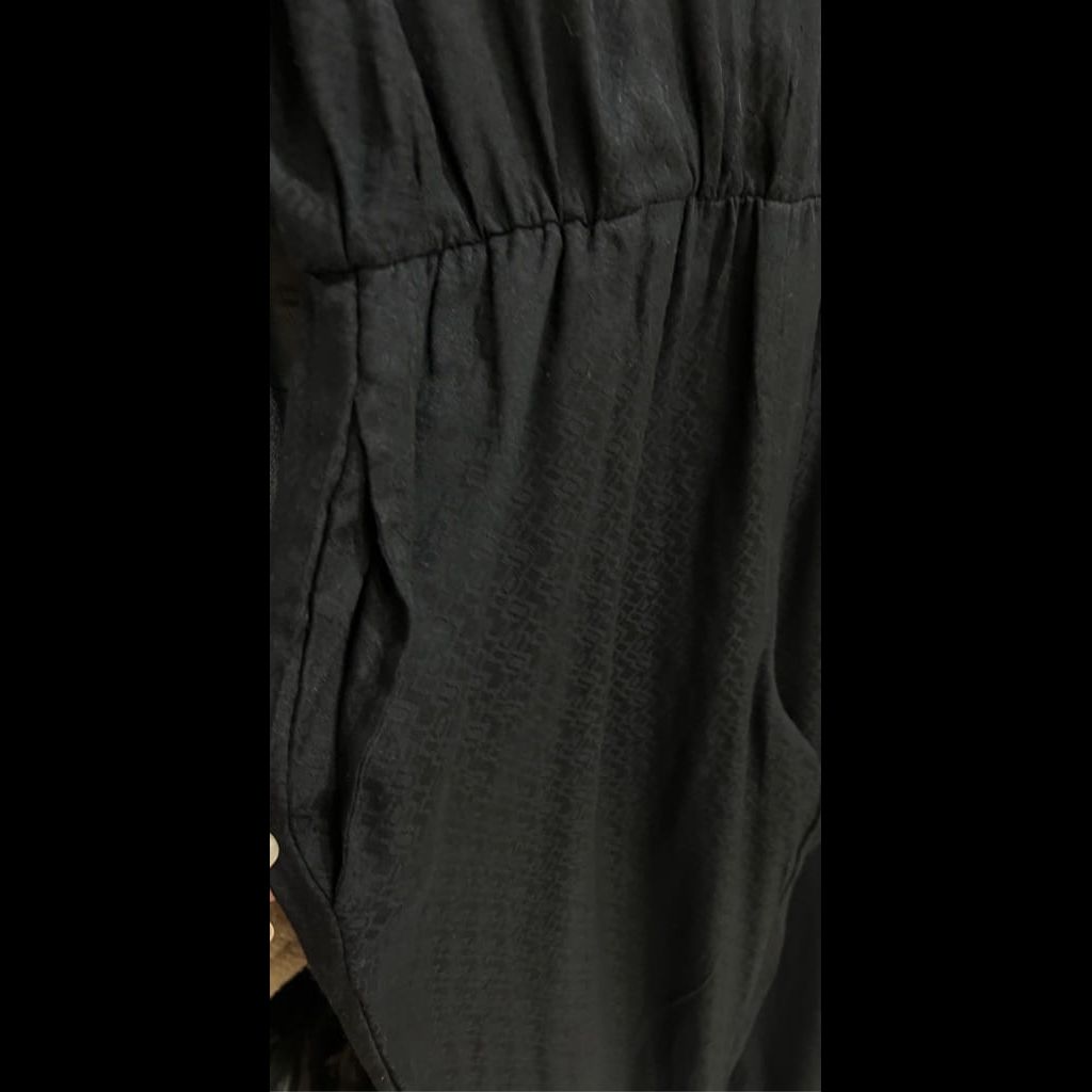 Black formal jumpsuit with pockets