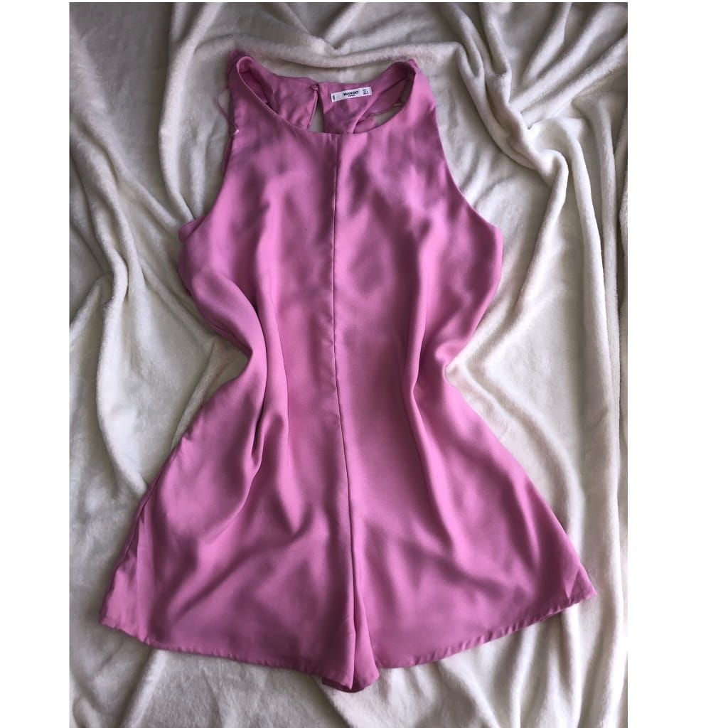 Pink romper with ruffles in the back