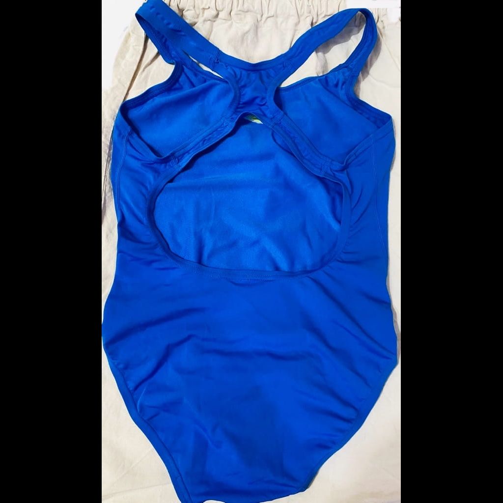 An azure blue speedo one piece swimsuit 🩱
