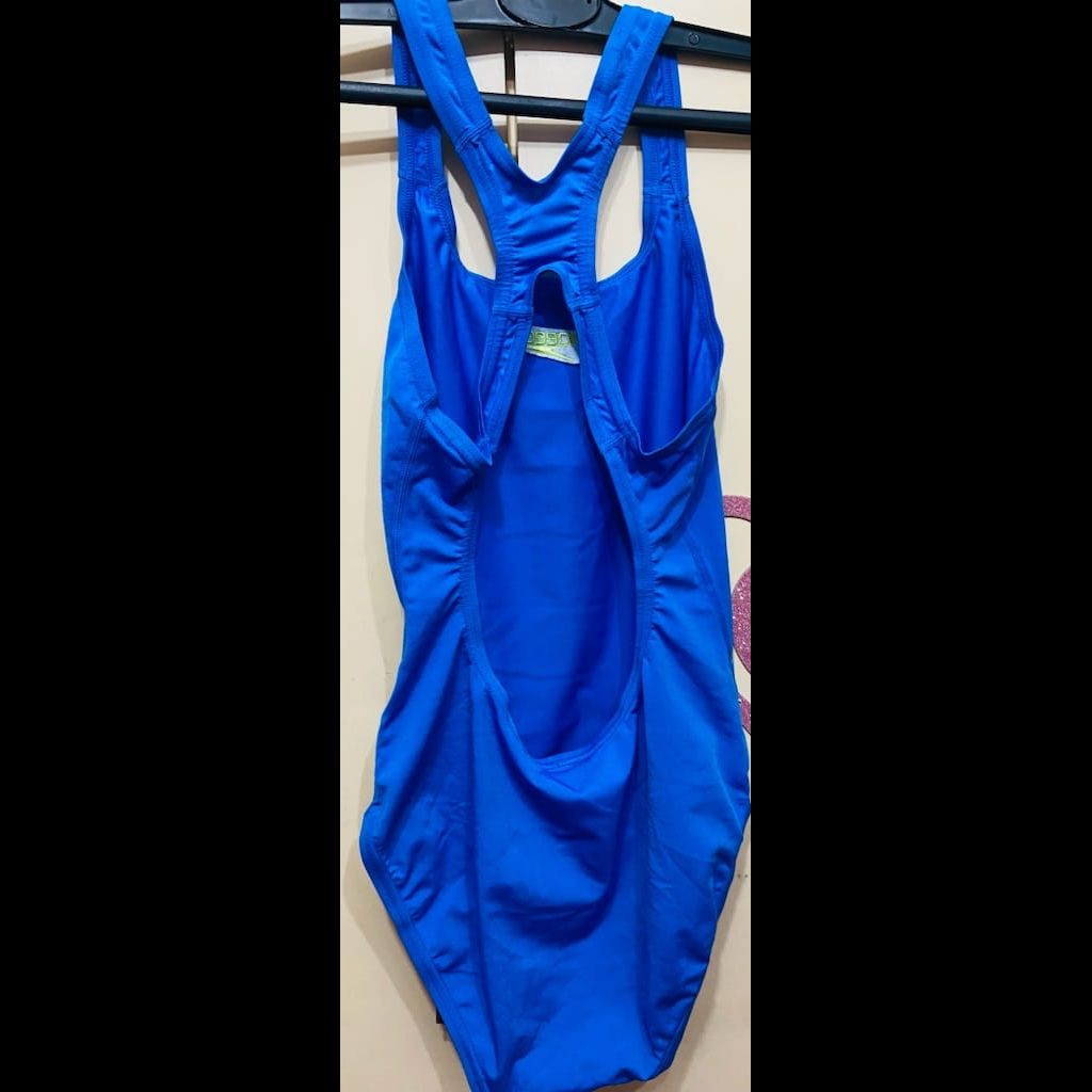 An azure blue speedo one piece swimsuit 🩱