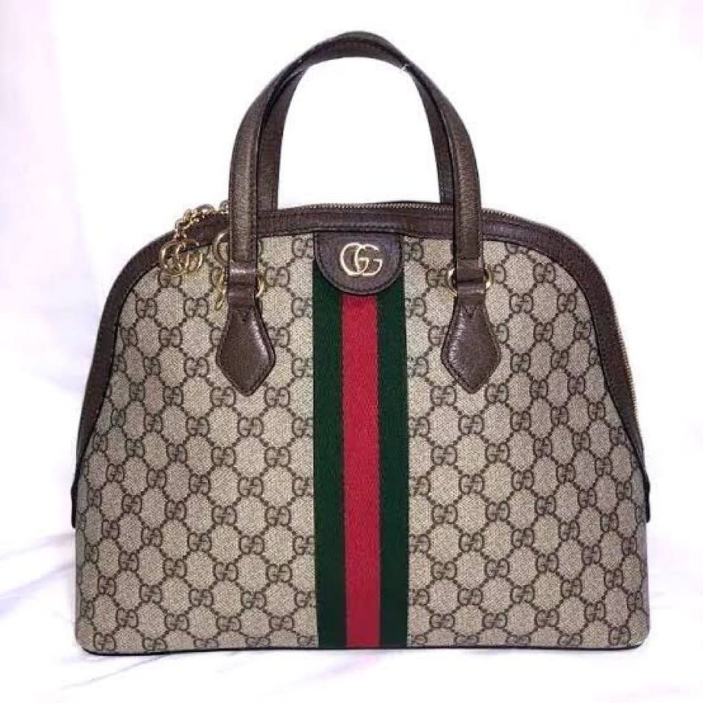 Gucci new without long strap and dust bag