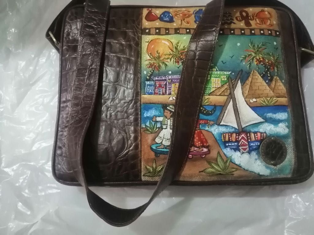 Genuine leather laptop bag with hand drawings