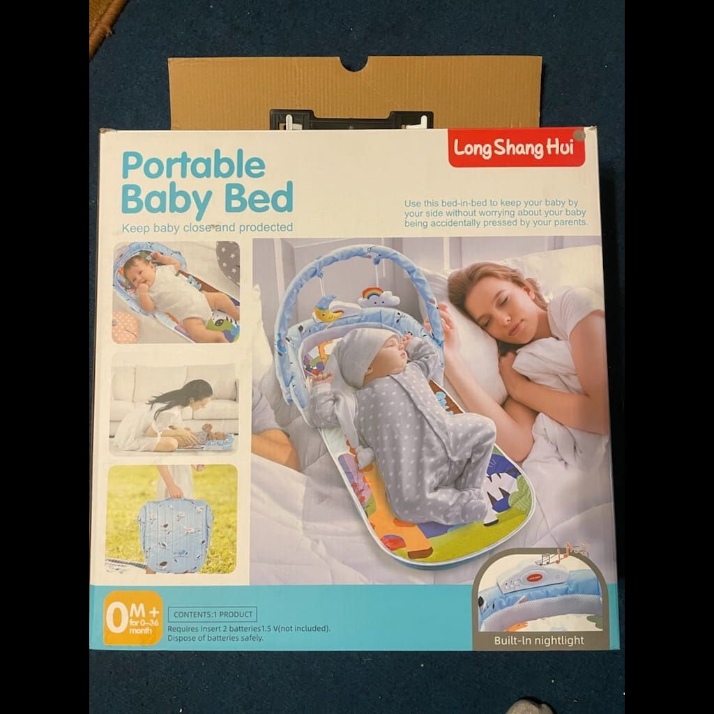 Portable baby bed